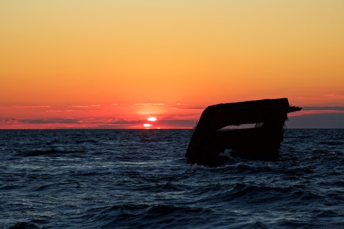 Photo of wreck of SS Atlantus at sunset