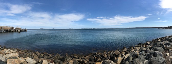 Massachusetts Bay with the shoreline of Plymouth, MA in the foreground.