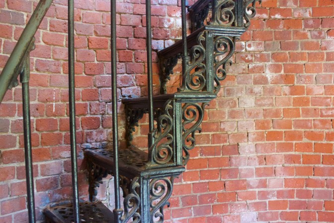 Wrought iron staircase in Highland light.
