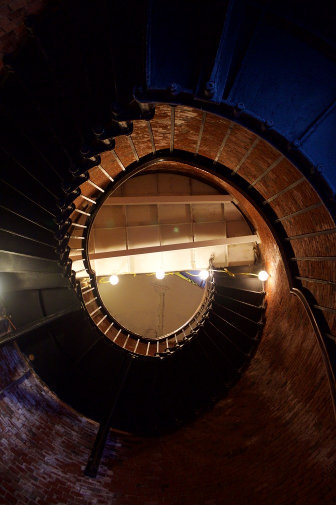 View of the staircase, looking upward from the bottom.
