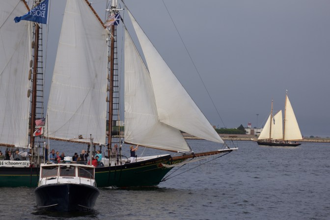 Two sailing ships in the harbor.