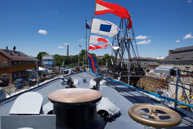 Bow of the Cassin Young. The Constitution and the Bunker Hill Monument are visible in the background.