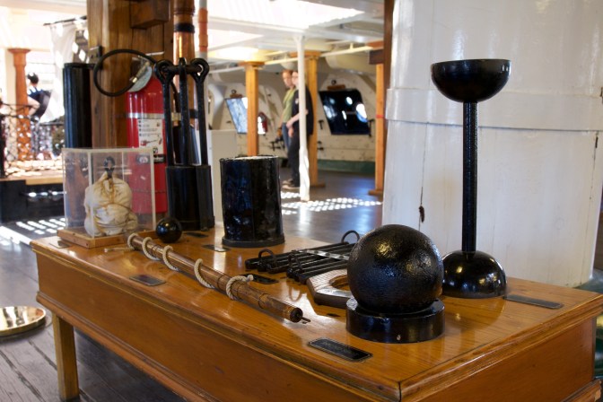 Munitions fired by Constitution's guns on a table on the gun deck.