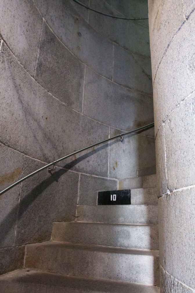 Stairs inside the monument. There is a number 10 on one of the stairs.