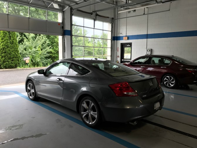 Photograph of Honda Accord in service bay at Honda dealership