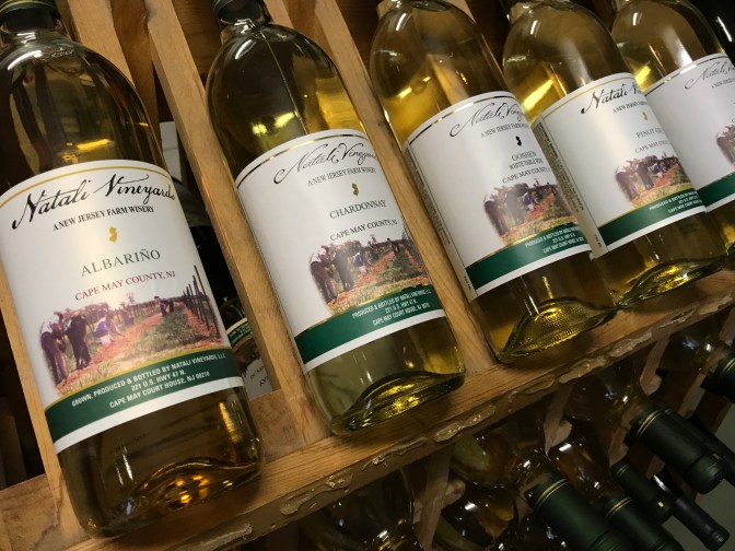 Bottles of wine on racks at Natali Vineyards.