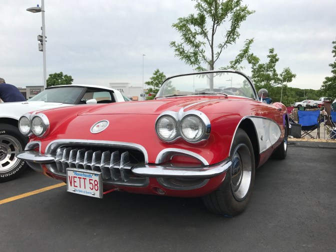 1958 red Chevrolet Corvette convertible.