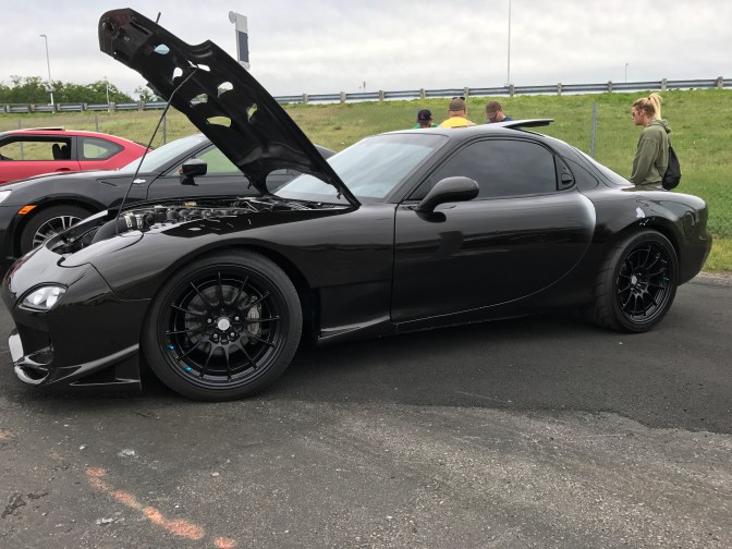 Black Mazda RX7.