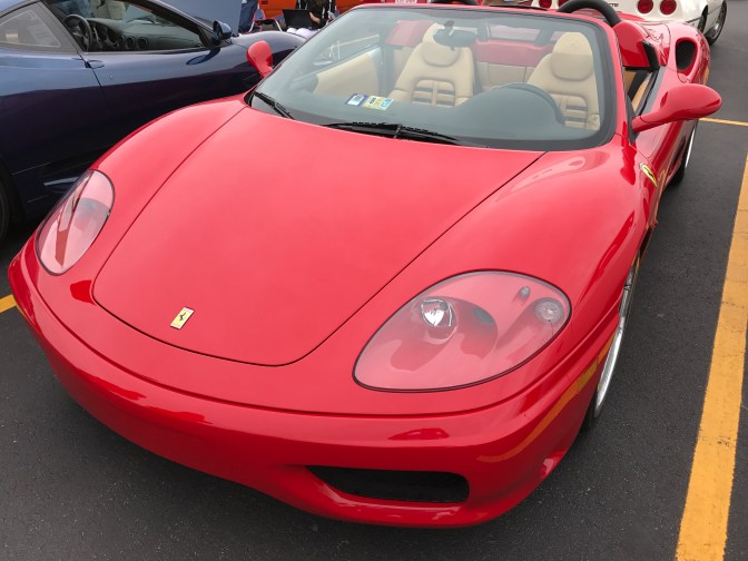 Red Ferrari convertible.