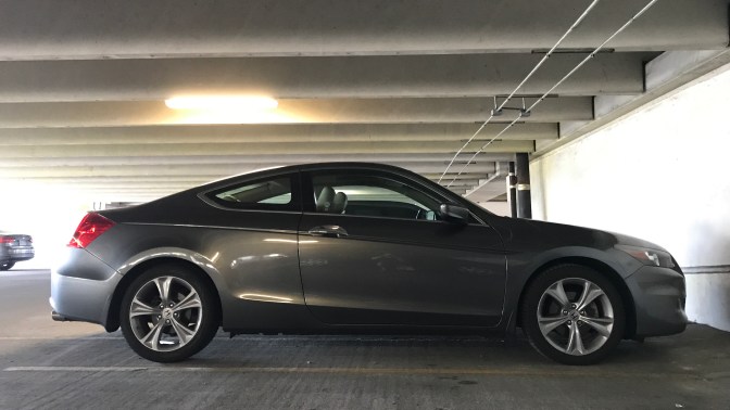 2012 Honda Accord coupe in a parking garage.