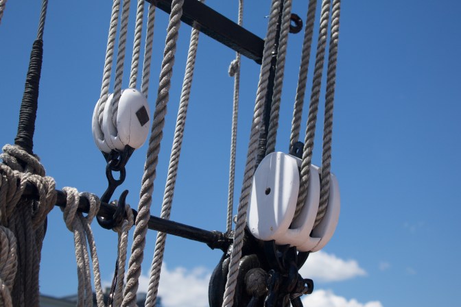 Blocks and ropes aboard the ship.