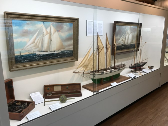 Exhibit on schooners, including two model ships, in the museum.