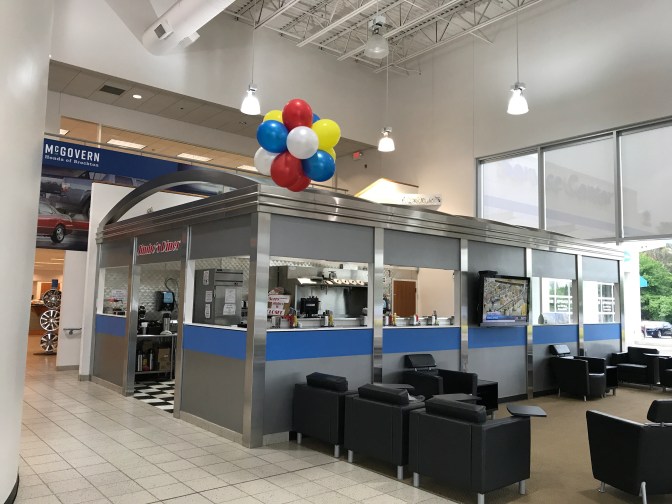 Diner in dealership waiting area.