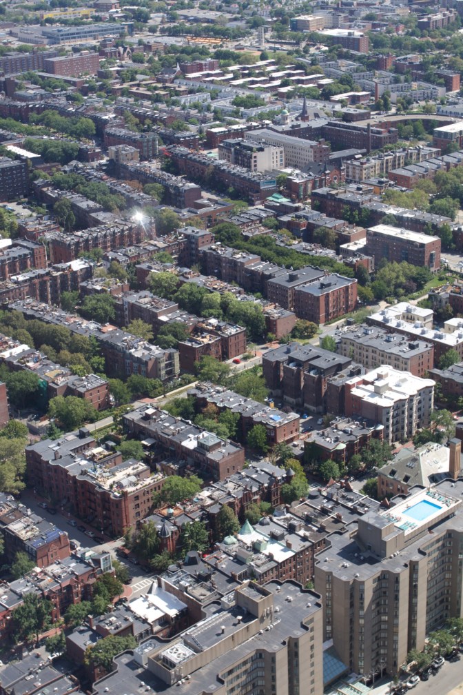Southern view. A series of apartment buildings and businesses dominate the view.