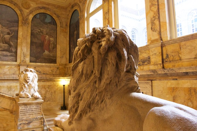 Statues of lions at the mid-point of the main staircase.