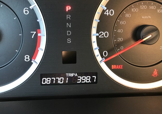 View of odometer on Honda Accord- it reads 87701.