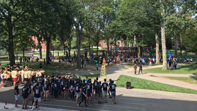 Harvard students playing games on the Yard in front of Widener Library.