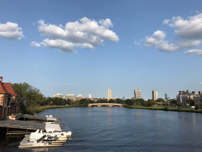 View of the Weeks Bridge over the Charles River. The Harvard Boathouse is on the left.