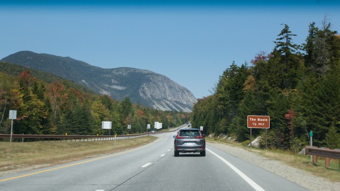 View of a highway. The White Mountains are in the distance.