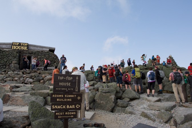 View of cairn at summit and Tip-Top House.