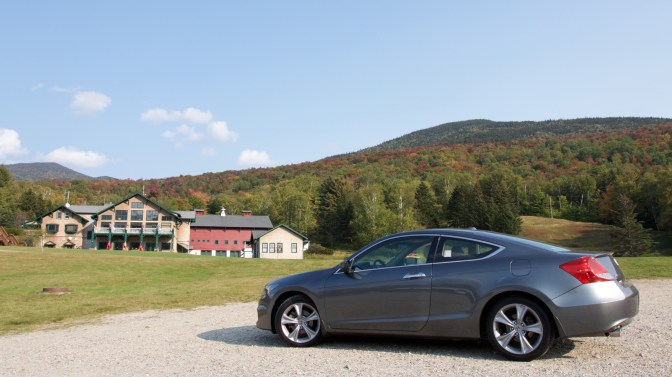 2012 Honda Accord parked in gravel lot in front of Mt. Washington Visitor's Center.