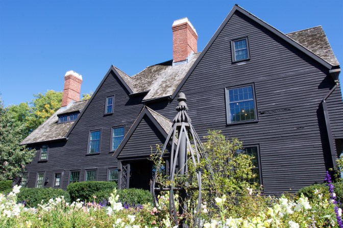 The House of Seven Gables. A garden is in the foreground.