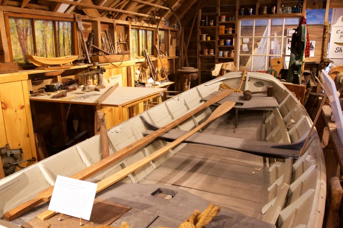 Display showing a boat workshop.