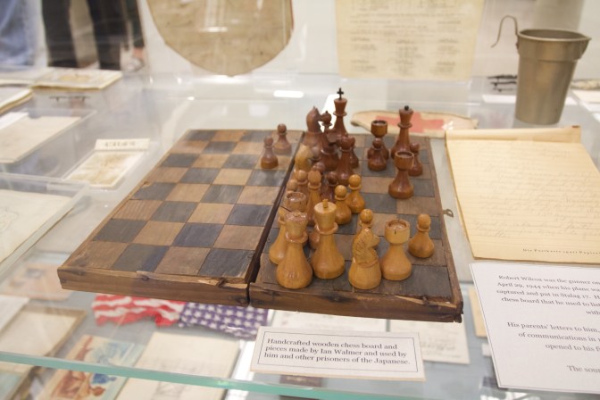 Wooden chess set and board.