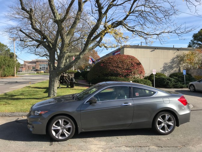 2012 Honda Accord parked in front of museum.