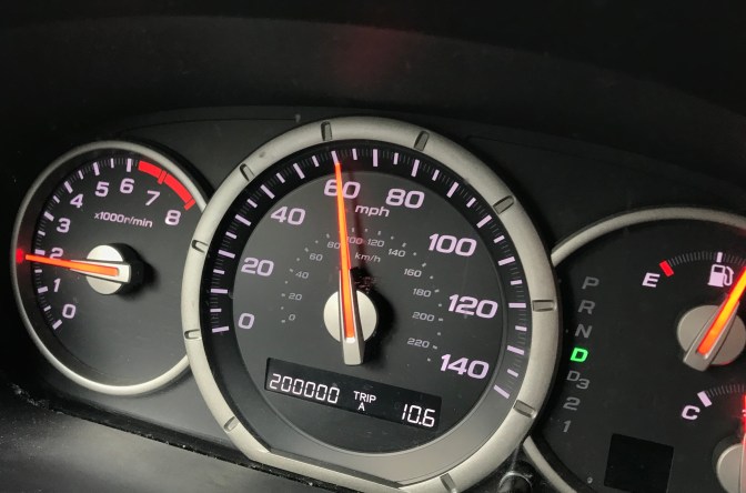 Odometer showing 200,000 miles.