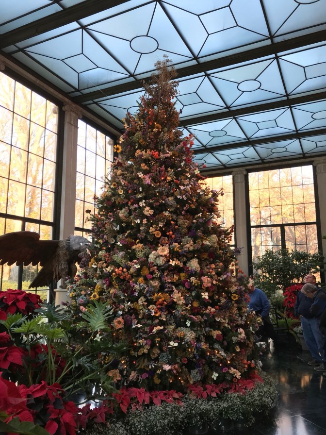 Christmas tree decorated with dried flowers.
