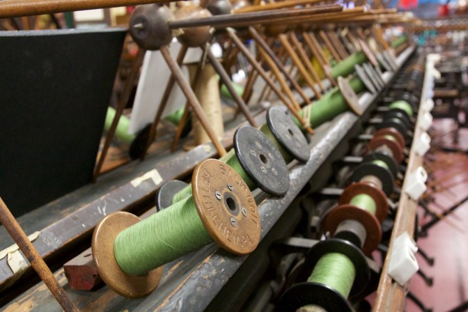 Spools of silk on silk winder.