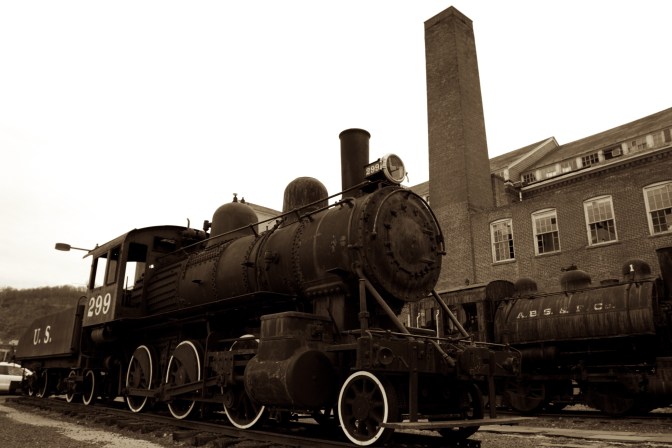 Two locomotives behind the museum.