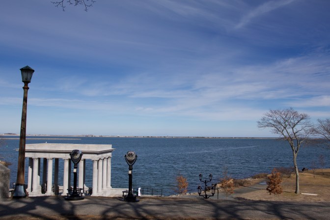 View of Plymouth Harbor, with the portico that houses Plymouth Rock in the foreground.
