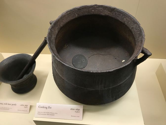 Iron cooking pot.