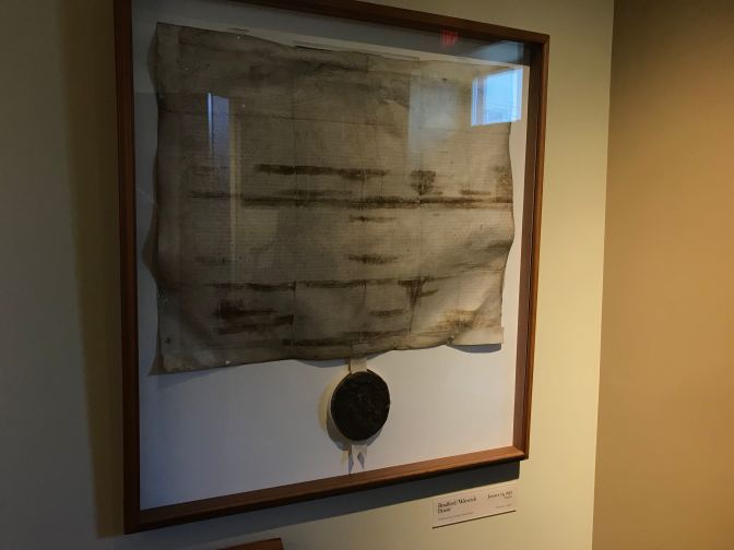 Bradford Patent, framed and behind glass.