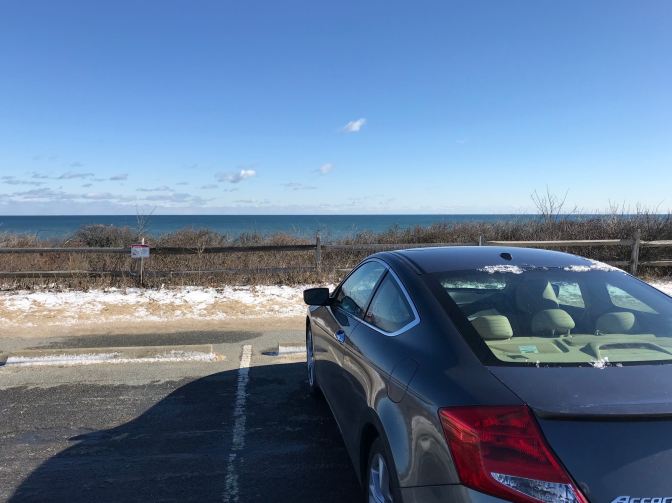 2012 Honda Accord in parking lot by ocean.