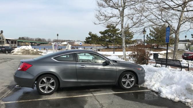 2012 Honda Accord in parking lot, snow near the vehicle.