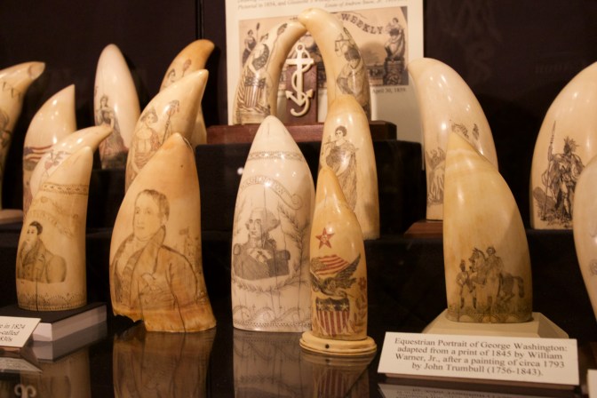 Carvings on whales teeth.
