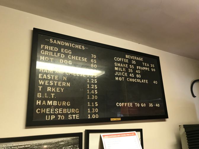 Menu board from 1981, listing items and prices.
