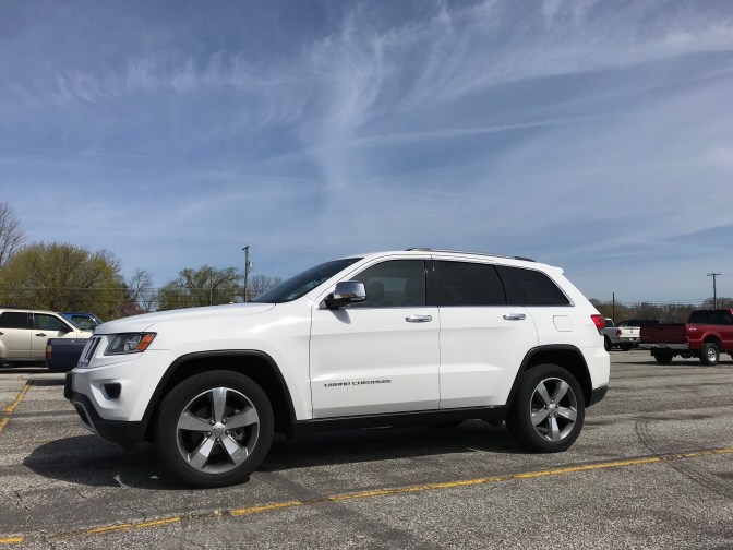 2014 Jeep Grand Cherokee Limited, in white.