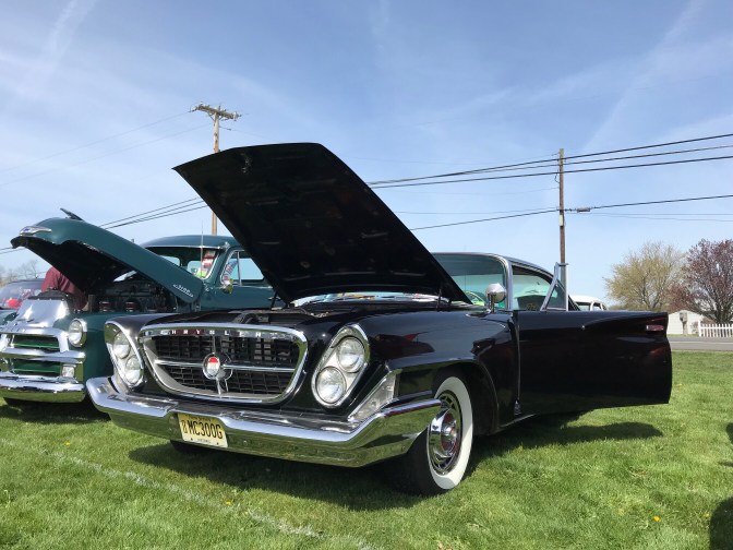 Black Chrysler 300 sedan.