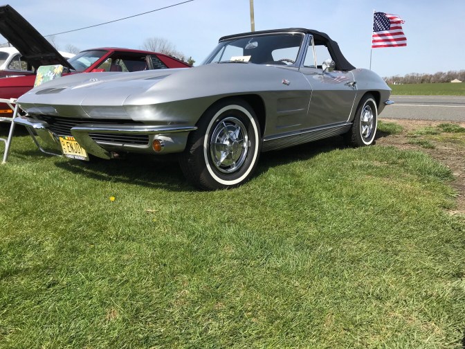 Silver second-generation Chevrolet Corvette.