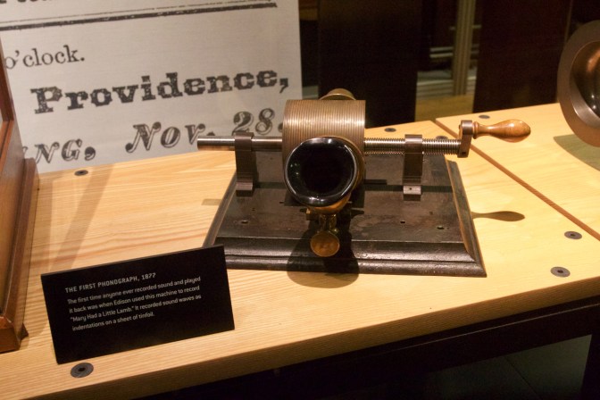 1877 Phonograph. A sign beside it indicates it is the first phonograph.