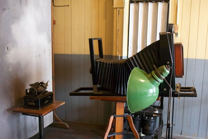 Old camera studio, with an old camera photographing a record player.