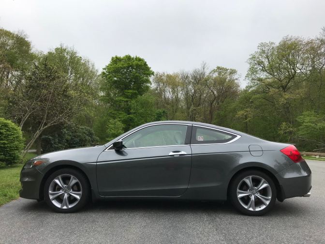 2012 Honda Accord coupe, parked in a parking lot.