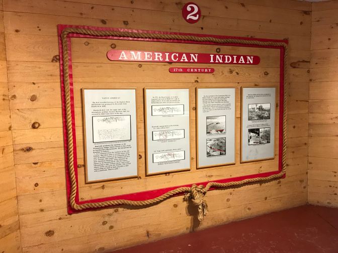 Wall placard display on theory of American Indian origin.