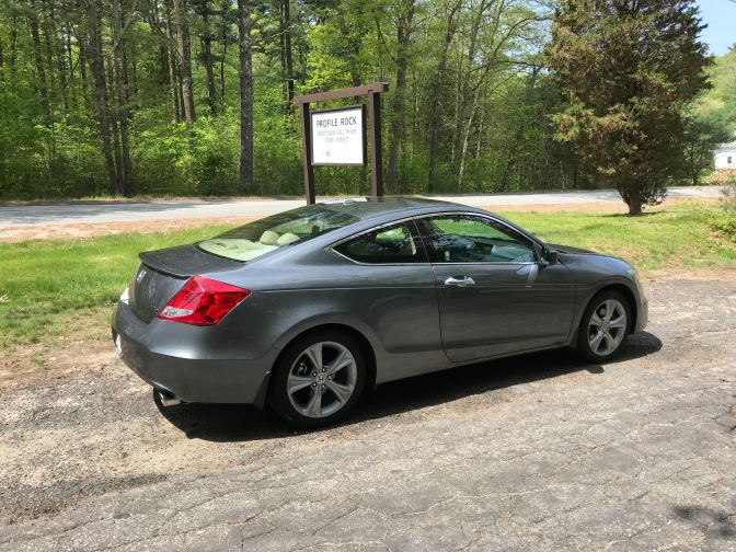 2012 Honda Accord in front of sign for Profile Rock.