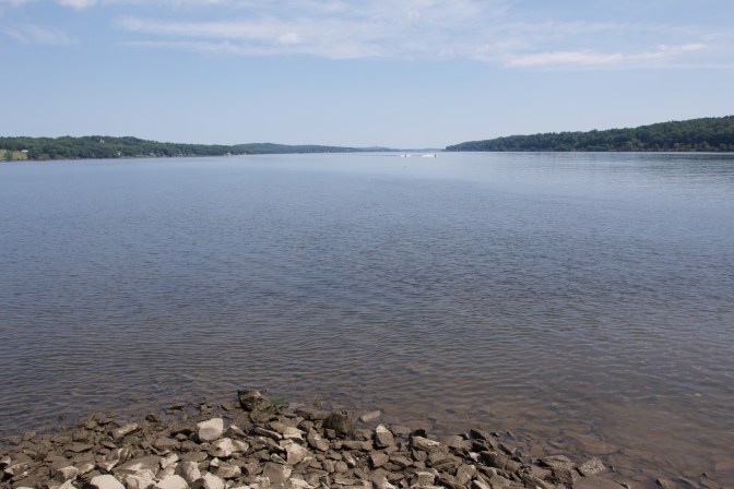 View of the Hudson River, with rocks in the foreground.