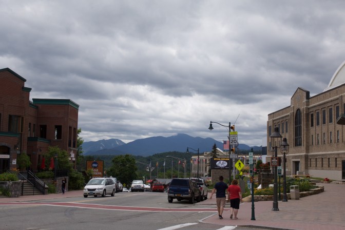 View of downtown Lake Placid, with mountains in the distance.